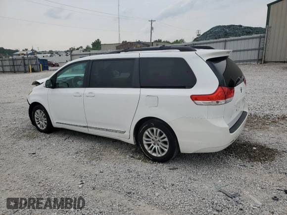 2012 Toyota Sienna XLE AAS с VIN 5TDYK3DC7CS207716, выставлен на аукционе Copart как лот 60592265 с пробегом 287 021 миль миль и Списание • Salvage title. История ставок и продаж доступна на DreamBid. Изображение 2.