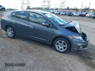 2013 Honda Insight EX z VIN JHMZE2H71DS004170, wystawiony jako IAAI lot #41971733 z przebiegiem 174 000 mil mil oraz . Historia ofert i sprzedaży dostępna na DreamBid. Obrazek 1.