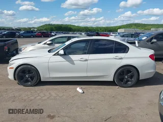2014 BMW 3 Series 328i with VIN WBA3A5C5XEJ463938, listed as a IAAI auction lot 42103330 with 194,263 mi miles and . Bid and sale history available at DreamBid. Image 14.