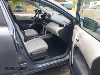 2023 Toyota Corolla Cross L with VIN 7MUAAAAGXPV060044, listed as a IAAI auction lot 42289062 with 29,837 mi miles and . Bid and sale history available at DreamBid. Image 5.