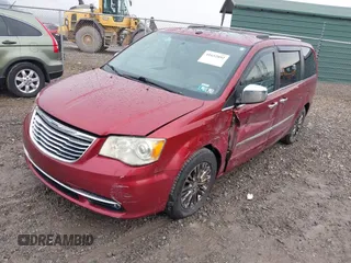 2011 Chrysler Town & Country Limited with VIN 2A4RR6DG1BR630717, listed as a IAAI auction lot 41652892 with 156,435 mi miles. Bid and sale history available at carsss.com. Image 2.
