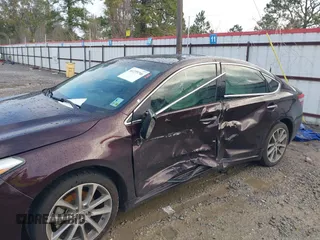 2014 Toyota Avalon Limited with VIN 4T1BK1EB5EU125963, listed as a IAAI auction lot 41273746 with 109,229 mi miles. Bid and sale history available at carsss.com. Image 6.