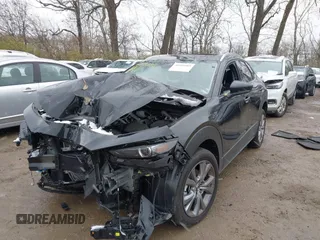 2023 Mazda CX-30 2.5 S Premium Package with VIN 3MVDMBDM3PM559627, listed as a IAAI auction lot 40910485 with 8,365 mi miles. Bid and sale history available at carsss.com. Image 18.
