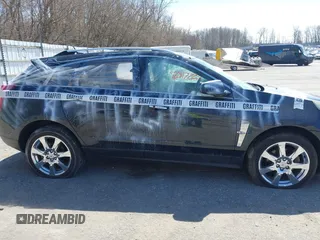 2011 Cadillac SRX Performance Collection with VIN 3GYFNEEY3BS560107, listed as a IAAI auction lot 42017220 with 243,740 mi miles and . Bid and sale history available at carsss.com. Image 13.