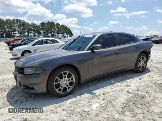 2015 Dodge Charger SXT with VIN 2C3CDXJG5FH806480, listed as a Copart auction lot 55393565 with 188,244 mi miles and Salvage title. Bid and sale history available at DreamBid. Image 1.