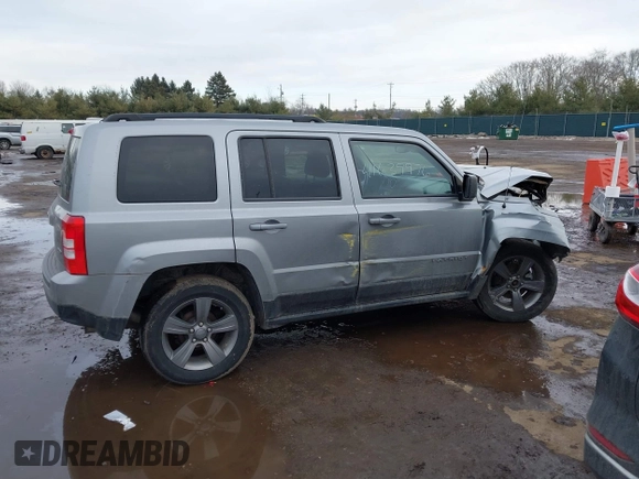 2015 Jeep Patriot Latitude z VIN 1C4NJRFB7FD412238, wystawiony jako IAAI lot #41639976 z przebiegiem 106 767 mil mil oraz . Historia ofert i sprzedaży dostępna na DreamBid. Obrazek 14.