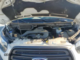 2018 Ford Transit z VIN 1FTYR2YM8JKA77474, wystawiony jako Copart lot #65424094 z przebiegiem 112 955 mil mil oraz Szkoda całkowita • Salvage title. Historia ofert i sprzedaży dostępna na DreamBid. Obrazek 13.