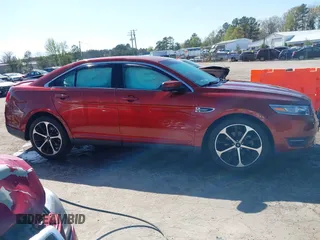 2014 Ford Taurus SEL with VIN 1FAHP2E81EG116790, listed as a IAAI auction lot 41995975 with 131,179 mi miles. Bid and sale history available at carsss.com. Image 13.