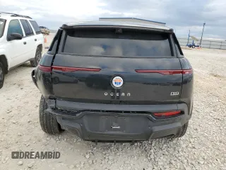 2023 Fisker Ocean One z VIN VCF1ZBU21PG005825, wystawiony jako Copart lot #85688444 z przebiegiem 12 331 mil mil oraz Szkody całkowita. Historia ofert i sprzedaży dostępna na DreamBid. Obrazek 6.