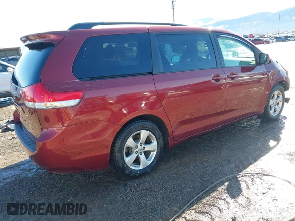 2011 Toyota Sienna LE AAS with VIN 5TDKK3DC6BS104887, listed as a IAAI auction lot 41653933 with 105,141 mi miles and . Bid and sale history available at DreamBid. Image 4.
