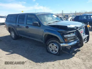 2006 GMC Canyon SLE1 with VIN 1GTDT136768277608, listed as a IAAI auction lot 41884392 with 128,834 mi miles. Bid and sale history available at carsss.com. Image 1.
