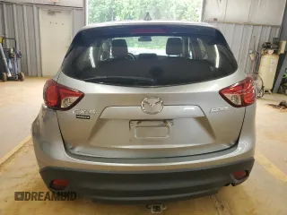 2013 Mazda CX-5 Sport with VIN JM3KE2BE6D0110272, listed as a Copart auction lot 57570725 with 124,475 mi miles and Salvage title. Bid and sale history available at DreamBid. Image 6.