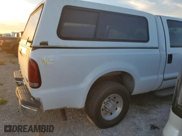 2000 Ford F-350 XL with VIN 1FTSW30S6YEC82315, listed as a Copart auction lot 75479334 with 327,345 mi miles and Salvage Title. Bid and sale history available at DreamBid. Image 13.