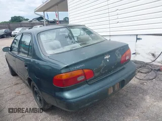 2000 Chevrolet Prizm LSi z VIN 1Y1SK5285YZ407771, wystawiony jako IAAI lot #42240643 z przebiegiem 237 408 mil mil oraz . Historia ofert i sprzedaży dostępna na DreamBid. Obrazek 3.