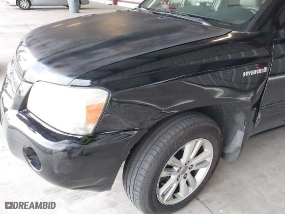 2007 Toyota Highlander Hybrid w/3rd Row with VIN JTEEW21A570035193, listed as a IAAI auction lot 41571679 with 143,627 mi miles. Bid and sale history available at carsss.com. Image 6.
