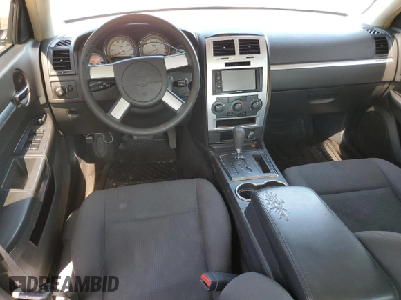 2010 Dodge Charger SXT with VIN 2B3CA3CV9AH165255, listed as a Copart auction lot 52170825 with 223,676 mi miles and Clean Title. Bid and sale history available at carsss.com. Image 8.