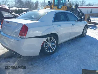 2016 Chrysler 300 with VIN 2C3CCAEG3GH225393, listed as a IAAI auction lot 41197790 with 129,453 mi miles. Bid and sale history available at carsss.com. Image 4.