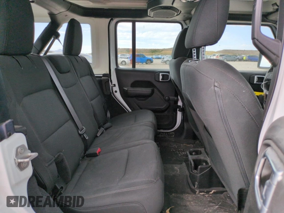 2023 Jeep Wrangler Sport S with VIN 1C4HJXDN5PW678653, listed as a Copart auction lot 57464705 with 22,154 mi miles and Salvage title. Bid and sale history available at DreamBid. Image 10.