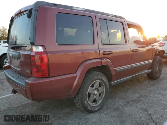2007 Jeep Commander Sport z VIN 1J8HG48P17C601121, wystawiony jako Copart lot #41482495 z przebiegiem 199 263 mil mil oraz Szkoda całkowita • Salvage title. Historia ofert i sprzedaży dostępna na DreamBid. Obrazek 3.