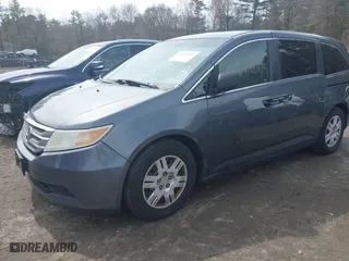 2011 Honda Odyssey LX with VIN 5FNRL5H23BB020474, listed as a IAAI auction lot 41971005 with 155,341 mi miles. Bid and sale history available at carsss.com. Image 2.