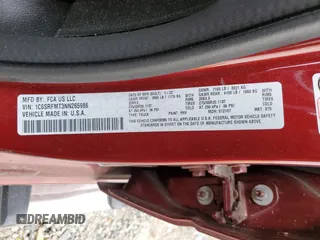 2022 Ram 1500 Big Horn with VIN 1C6SRFMT3NN265986, listed as a Copart auction lot 83177674 with 27,077 mi miles and Salvage title. Bid and sale history available at DreamBid. Image 14.