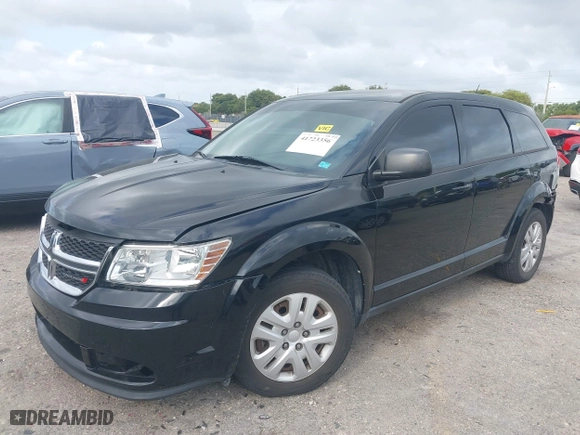 2015 Dodge Journey American Value Pkg with VIN 3C4PDCAB9FT712748, listed as a IAAI auction lot 41723356 with 132,840 mi miles. Bid and sale history available at carsss.com. Image 17.