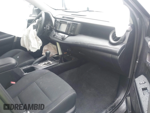 2018 Toyota RAV4 XLE with VIN 2T3RFREV5JW701564, listed as a IAAI auction lot 41976067 with 128,404 mi miles. Bid and sale history available at carsss.com. Image 5.