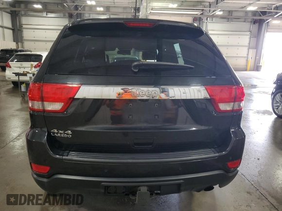 2011 Jeep Grand Cherokee Laredo with VIN 1J4RR4GG3BC632218, listed as a Copart auction lot 53311005 with 177,297 mi miles and Salvage Title. Bid and sale history available at carsss.com. Image 6.