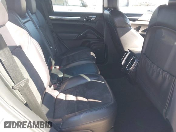2013 Porsche Cayenne GTS with VIN WP1AD2A22DLA71143, listed as a IAAI auction lot 41287138 with 143,434 mi miles and . Bid and sale history available at DreamBid. Image 8.