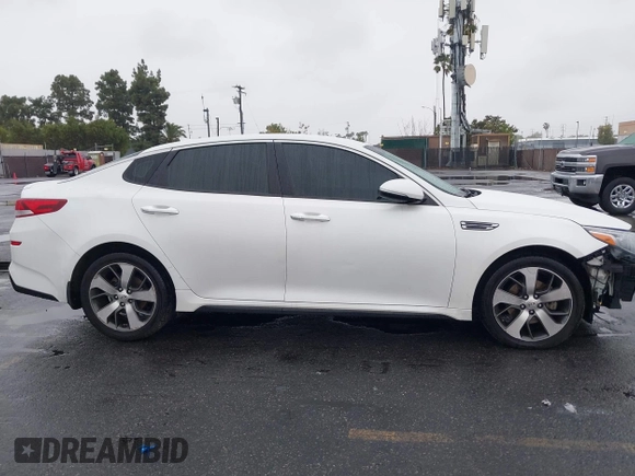 2020 Kia Optima LX with VIN 5XXGT4L32LG426259, listed as a IAAI auction lot 41569308 with 114,656 mi miles. Bid and sale history available at carsss.com. Image 13.