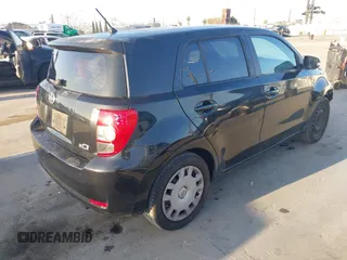 2011 Scion xD with VIN JTKKU4B46B1009909, listed as a IAAI auction lot 41959824 with 185,764 mi miles. Bid and sale history available at carsss.com. Image 4.