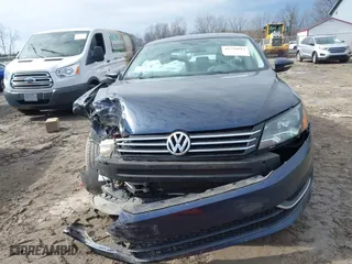 2012 Volkswagen Passat SE with VIN 1VWBP7A31CC036754, listed as a IAAI auction lot 41720013 with 130,139 mi miles. Bid and sale history available at carsss.com. Image 12.