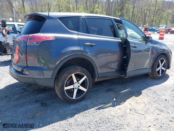 2018 Toyota RAV4 LE with VIN JTMBFREV0JJ722483, listed as a IAAI auction lot 41982973 with 83,012 mi miles. Bid and sale history available at carsss.com. Image 4.