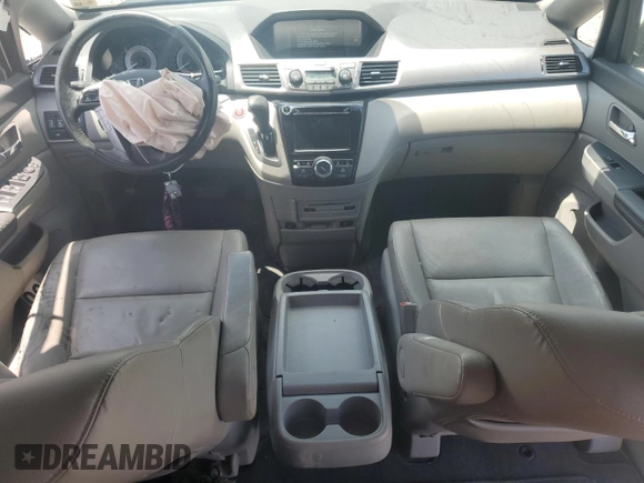 2014 Honda Odyssey EX-L with VIN 5FNRL5H62EB112280, listed as a Copart auction lot 60138645 with 167,657 mi miles and Salvage title. Bid and sale history available at DreamBid. Image 8.