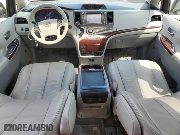 2012 Toyota Sienna XLE AAS with VIN 5TDYK3DCXCS199580, listed as a Copart auction lot 52455405 with 113,259 mi miles and Salvage Title. Bid and sale history available at DreamBid. Image 8.