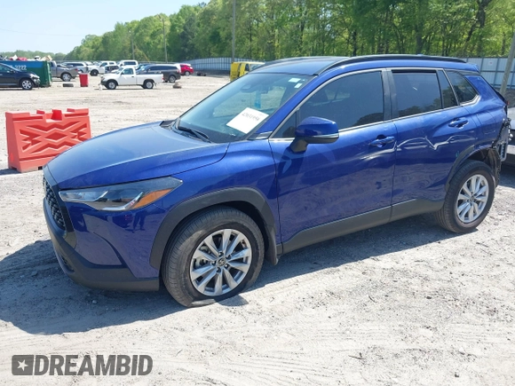 2023 Toyota Corolla Cross LE with VIN 7MUCAAAG8PV065431, listed as a IAAI auction lot 42031958 with 25,000 mi miles and . Bid and sale history available at DreamBid. Image 18.