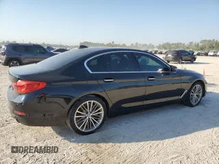 2018 BMW 5 Series 530i with VIN WBAJA5C54JG899845, listed as a Copart auction lot 76386124 with 57,379 mi miles and Salvage Title. Bid and sale history available at DreamBid. Image 3.