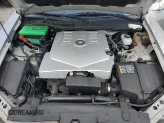 2006 Cadillac CTS with VIN 1G6DM57T860124659, listed as a Copart auction lot 57287985 with 141,162 mi miles and Salvage title. Bid and sale history available at DreamBid. Image 11.