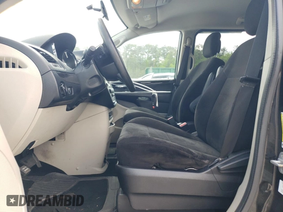 2013 Dodge Grand Caravan SXT with VIN 2C4RDGCG0DR523978, listed as a Copart auction lot 52805515 with 176,515 mi miles and Salvage Title. Bid and sale history available at DreamBid. Image 7.