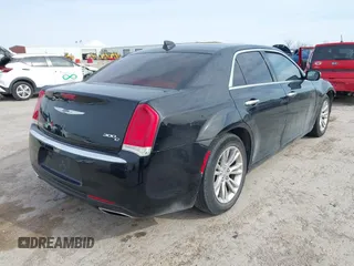 2016 Chrysler 300 with VIN 2C3CCAEG5GH189836, listed as a IAAI auction lot 41739098 with 141,179 mi miles. Bid and sale history available at carsss.com. Image 4.