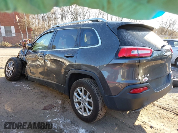2015 Jeep Cherokee Latitude with VIN 1C4PJMCSXFW725644, listed as a IAAI auction lot 41312764 with 191,714 mi miles and . Bid and sale history available at DreamBid. Image 3.