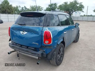2012 MINI Countryman S with VIN WMWZC3C56CWM27592, listed as a IAAI auction lot 42175396 with 147,600 mi miles and . Bid and sale history available at DreamBid. Image 4.