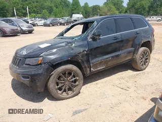 2016 Jeep Grand Cherokee Overland with VIN 1C4RJFCG5GC408390, listed as a IAAI auction lot 42140038 with 140,507 mi miles and . Bid and sale history available at DreamBid. Image 2.