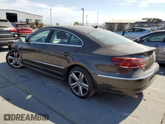 2014 Volkswagen CC R-Line with VIN WVWBP7AN7EE537157, listed as a Copart auction lot 65404654 with 153,336 mi miles and Salvage Title. Bid and sale history available at DreamBid. Image 2.