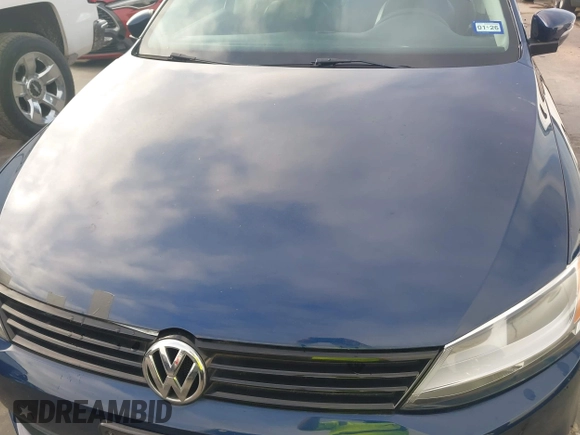 2014 Volkswagen Jetta SE z VIN 3VWD17AJ5EM369548, wystawiony jako IAAI lot #42588501 z przebiegiem 115 062 mil mil oraz . Historia ofert i sprzedaży dostępna na DreamBid. Obrazek 6.