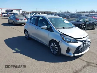 2015 Toyota Yaris L with VIN VNKKTUD38FA048576, listed as a IAAI auction lot 41823728 with 147,476 mi miles. Bid and sale history available at carsss.com. Image 1.