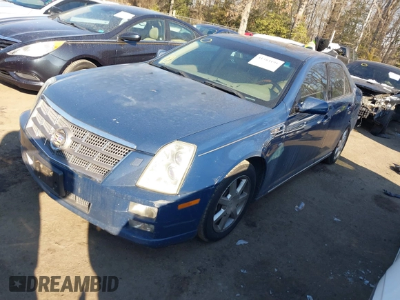 2009 Cadillac STS AWD w/1SB with VIN 1G6DD67VX90130281, listed as a IAAI auction lot 41384191 with 102,943 mi miles. Bid and sale history available at carsss.com. Image 2.