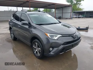 2018 Toyota RAV4 XLE z VIN JTMWFREV7JJ729707, wystawiony jako IAAI lot #39446012 z przebiegiem 78 150 mil mil oraz . Historia ofert i sprzedaży dostępna na DreamBid. Obrazek 1.