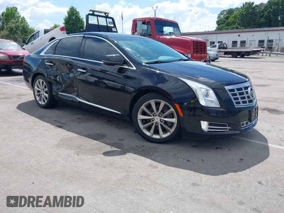2014 Cadillac XTS Luxury z VIN 2G61N5S30E9170305, wystawiony jako IAAI lot #42223317 z przebiegiem 103 692 mil mil oraz . Historia ofert i sprzedaży dostępna na DreamBid. Obrazek 1.