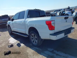 2017 Nissan Titan SL with VIN 1N6AA1E64HN565318, listed as a IAAI auction lot 41322120 with 114,515 mi miles and . Bid and sale history available at DreamBid. Image 3.